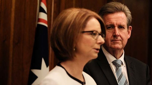 Prime Minister Julia Gillard and NSW Premier Barry O'Farrell: The majority of money promised in their agreement will flow in the remaining years of the deal's six-year phase-in period.