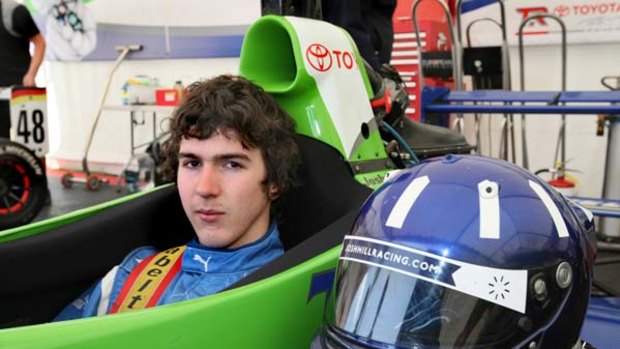Hot seat ... rookie racing driver Josh Hill has a big name to live up to but has his eyes fixed firmly on the tough road ahead.