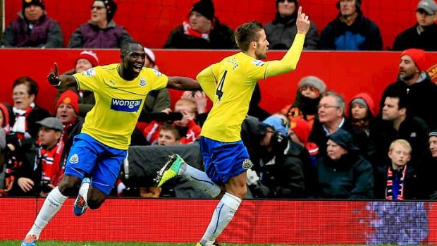 Yohan Cabaye of Newcastle celebrates after scoring the winner against Manchester United.