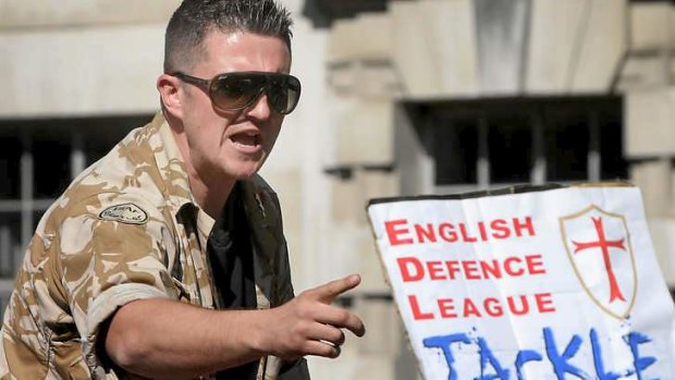 English Defence League leader Tommy Robinson speaks to supporters during a rally outside Downing Street this week.