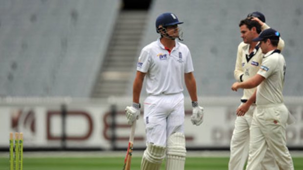 Frustrated ... England's Alastair Cook falls for 10 runs thanks to the precise delivery of Clint McKay, who took 4-68 overall. The match was called off with England 6-211.