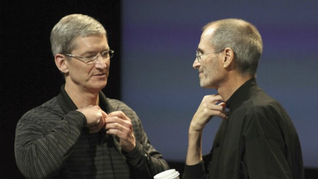 Apple's past and present CEOs Tim Cook (left) and his predecessor, the late Steve Jobs.