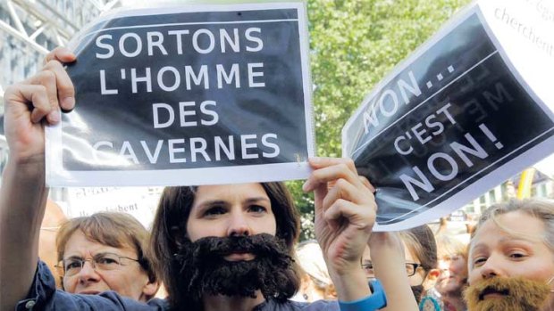Protesters in Paris call on France to abandon its ‘‘caveman attitudes’’ towards women.