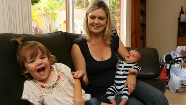 Work from home ... Karen Taylor, who  will return to work after four months’ maternity leave, with  Lily and Charlie.