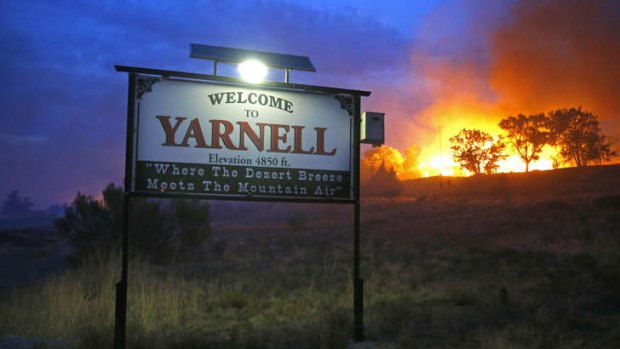 Lightning strike: The bushfire sweeps through the town of Yarnellin Arizona.