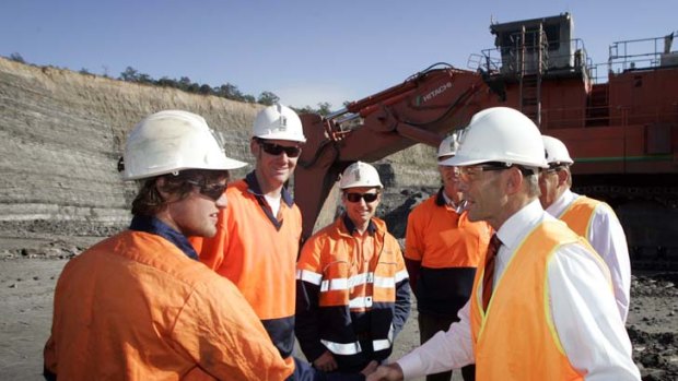 Tony Abbott with workers at Bloomfield mine.