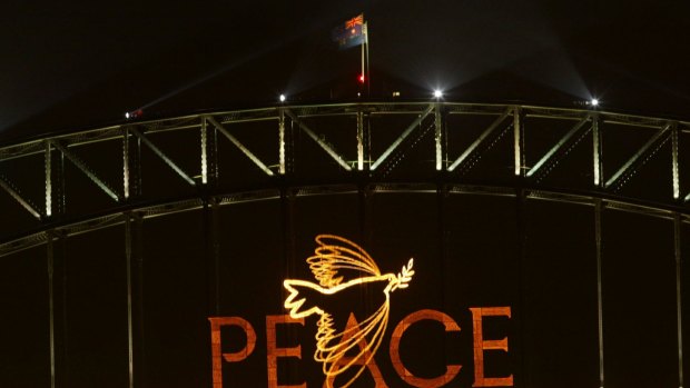 An illuminated dove and the word "peace" decorated the Sydney Harbour Bridge for New Year's Eve in 2002.