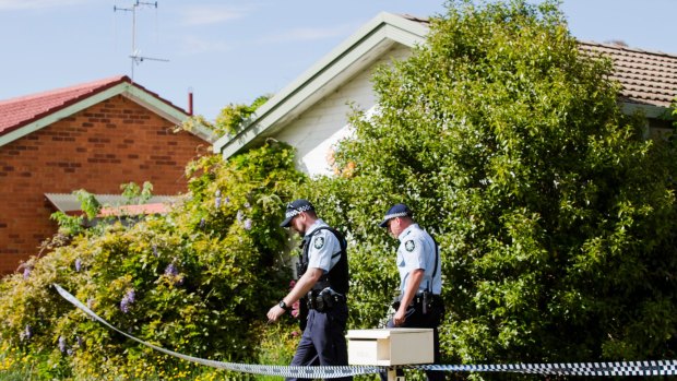A woman was killed and a man hospitalised following a vicious dog attack on Molesworth Street at Watson on Wednesday morning. 