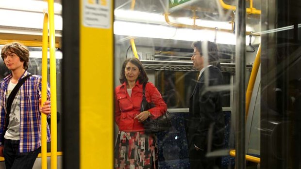 Stuck in the middle with you ... Gladys Berejiklian shares commuters' frustrations as City Rail services ground to a halt yesterday.