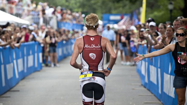 Hard slog ... a competitor finishes the Ironman US Championship in New York at the weekend.