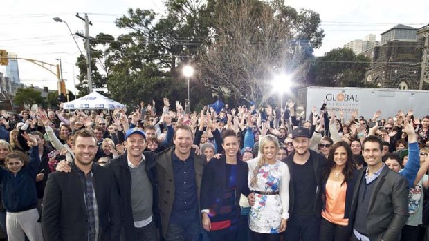 Auction fever: the renovators and their fans.