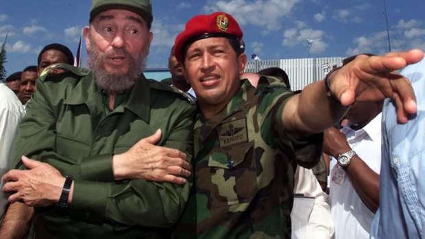 Friends ... Fidel Castro, left, talks with Hugo Chavez.