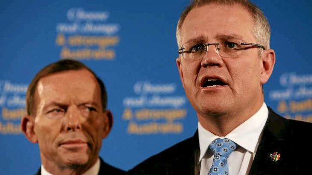 Coalition immigration spokesman Scott Morrison, right, and Opposition Leader Tony Abbott at a press conference regarding asylum seeker policy.