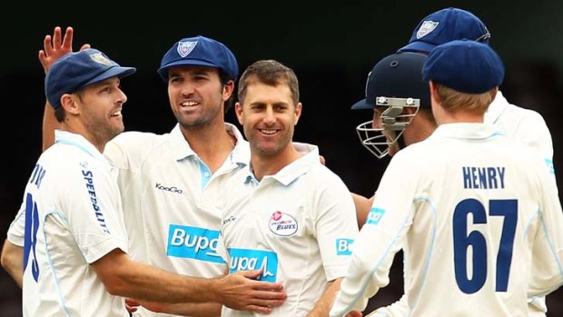 No-fuss cricketer &#8230; Simon Katich, centre, has retired from first-class cricket in Australia.