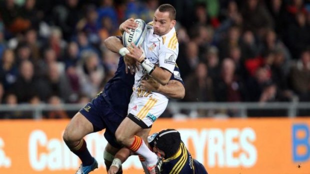 Going nowhere: Aaron Cruden is tackled by Nasi Manu.