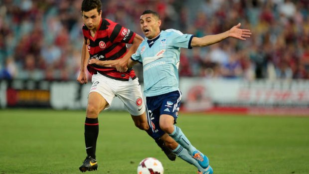 Wanderers young gun Daniel Alessi tackles Sydney FC's Ali Abbas at Pirtek Stadium/