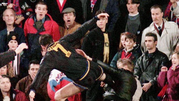 Unforgettable: Eric Cantona takes on a Crystal Palace fan at Selhurst Park in 1995.