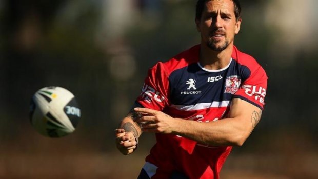Roosters halfback Mitchell Pearce sends out a pass during training on Thursday.