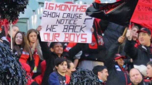 Essendon fans show support for their team during round 13.