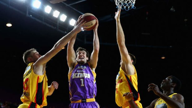 Ben Madgen of the Kings lays the ball up during the round one NBL match between the Sydney Kings and the Melbourne Tigers at Sydney Entertainment Centre.