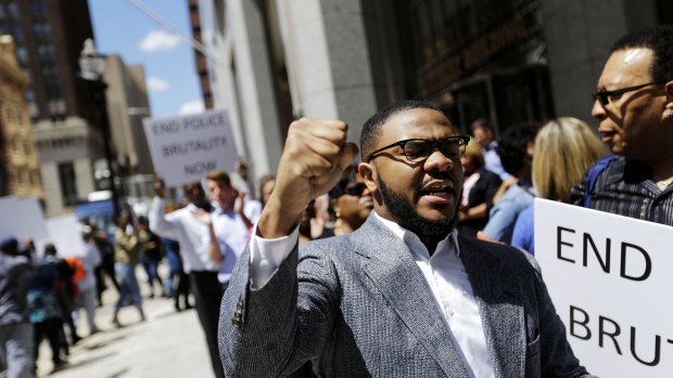 Melech Thomas chants during a demonstration outside the State Attorney's office calling for the continued investigation into the death of Freddie Gray in Baltimore. 