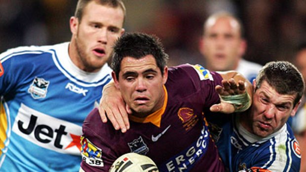 'Do or die' ... Bronco Corey Parker takes on the Titans earlier in the season.