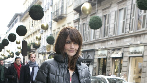 Heart smart casual ... Helena Christensen dresses down for a stroll through the streets of Milan.