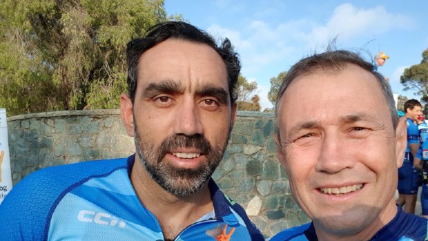 Health Minister Roger Cook with Adam Goodes.