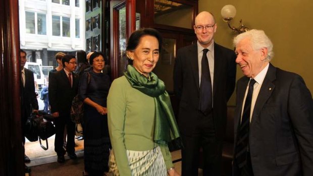 Humble: Aung San Suu Kyi with Frank Lowy and Dr Michael Fullilove at the Lowy Institute. on Thursday.