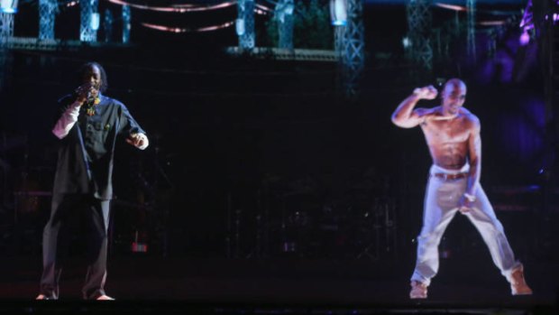 Snoop Dogg appears with a hologram of the late Tupac Shakur at  Coachella festival in California.