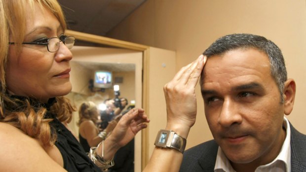 "Happiest night of my life''...Mauricio Funes, a former TV journalist and the first FMLN presidential candidate not to have been a guerilla, gets ready for an interview