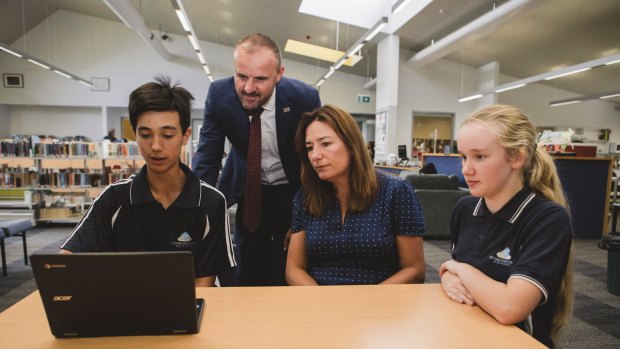 ACT Chief Minister Andrew Barr with Year 8 students Kayan Watterson and Victoria Burgess.