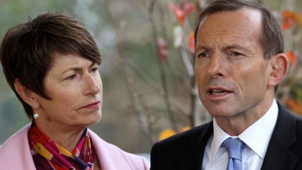 Opposition Leader Tony Abbott and wife Margie at a school on Monday where he made his comments about the switch to an emissions trading scheme.