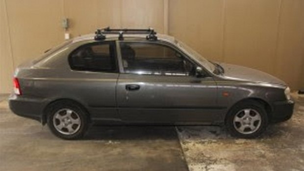 Police are asking for information on a dark grey Hyundai Accent.