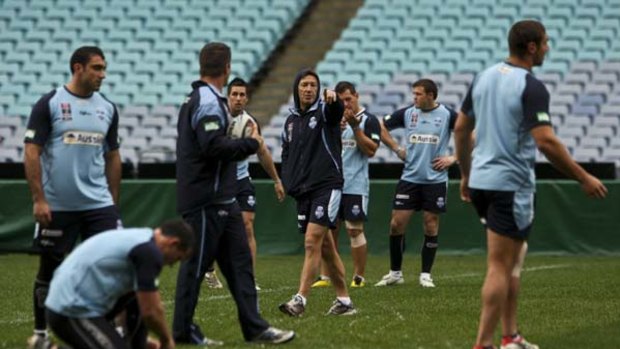 Craig Bellamy directs his troops during a training session at ANZ Stadium on Tuesday.