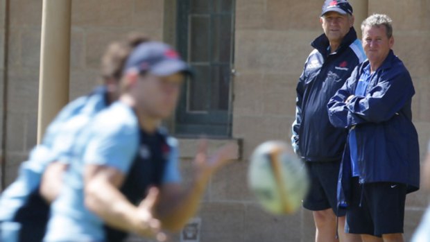 Hick town ... Chris Hickey oversees a Waratahs training session earlier this week. He says he is a better coach after his first Super season.