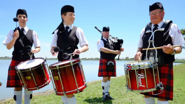 Members of the Williamstown RSL Pipe band perform in Altona on Saturday.