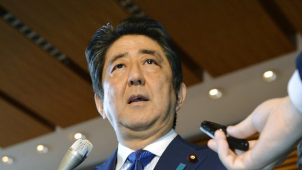 Japanese Prime Minister Shinzo Abe speaks to the media as he expresses support for the US missile attack on a Syrian government-controlled air base.
