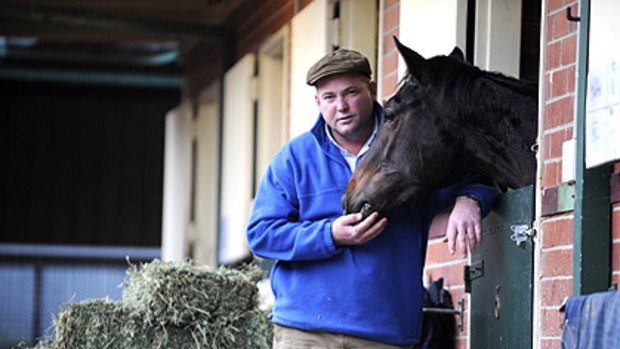 Peter Moody at his stables yesterday.