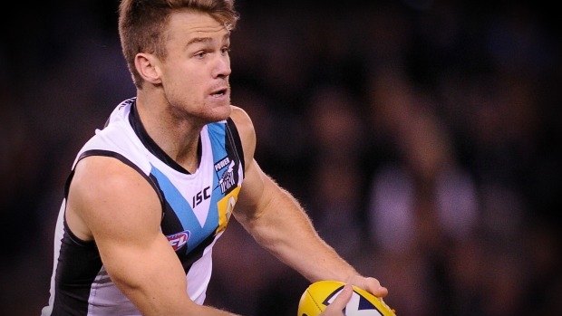 Port Adelaide's Robbie Gray has re-signed until the end of 2019.