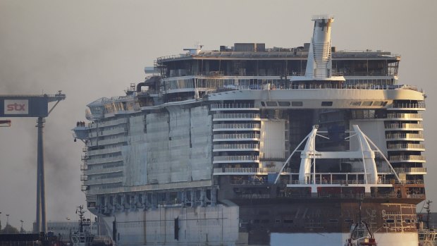 Massive liner in works ... The Harmony of the Seas (Oasis 3) class ship is put into the water at the STX Les Chantiers de l'Atlantique shipyard site in Saint-Nazaire, France. 