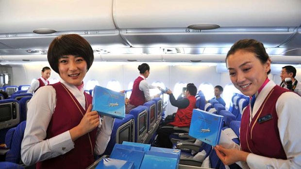 On the up ... China Southern staff on an Airbus A380.