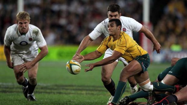 Will Genia passes the ball during the Cook Cup Test Match at ANZ Stadium on June 19, 2010.