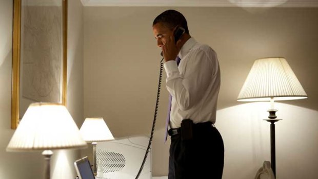 Presidential moment: Barack Obama takes an important call.