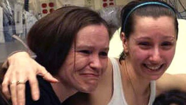 Kidnap victim Amanda Berry (right) is reunited with her sister, Beth Serrano.