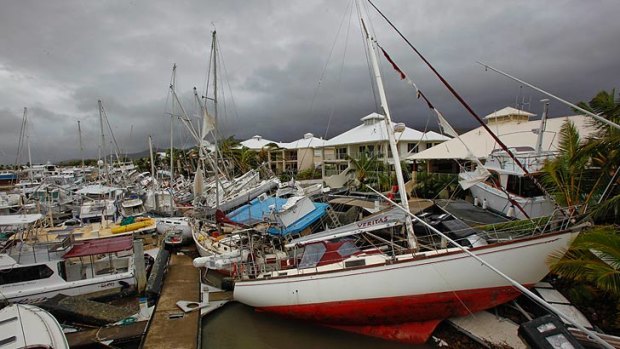 Boats lay strewn around Port Hinchinbrook in the wake of Cyclone Yasi in 2011.