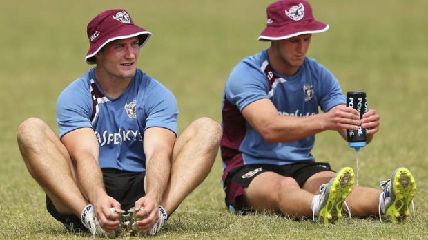 Winning combination: Kieran Foran, left, and Daly Cherry-Evans warm down during a pre-season training session.