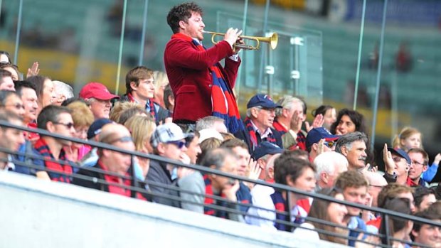 Full flight: The Melbourne bugler.