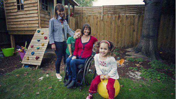 Clare Carlisle Stranger with charges Callum, 6 and Clare, 4, and their mother Julianne Adams.