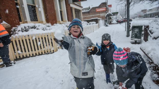 Fun in the snow as local children stay home from school and play in the Biggest snow fall in around 40 yrs as locals wake to a winter wounderland in Oberon NSW this morning .

